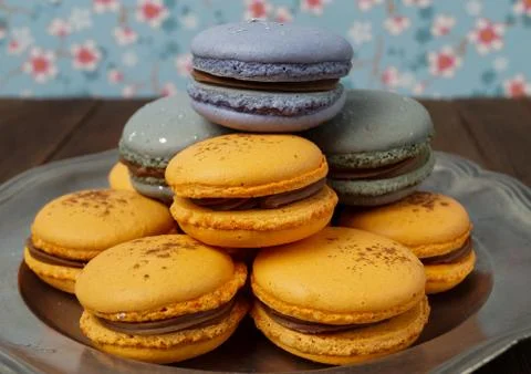 Macaroons served on a silver plate Stock Photos