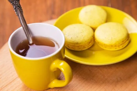 Macaroons with tea Stock Photos