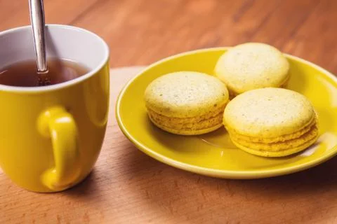 Macaroons with tea Stock Photos