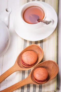 Macaroons with tea Stock Photos