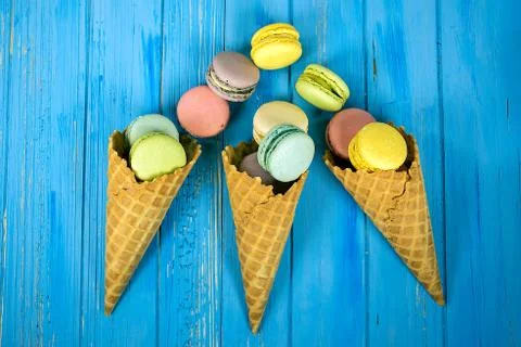 Macaroons in waffle cone Stock Photos