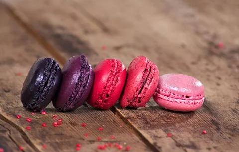 Macaroons on a wooden rustic table Stock-Fotos