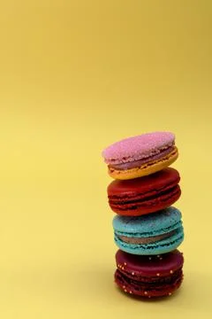 Macaroons on the yellow background Stock Photos