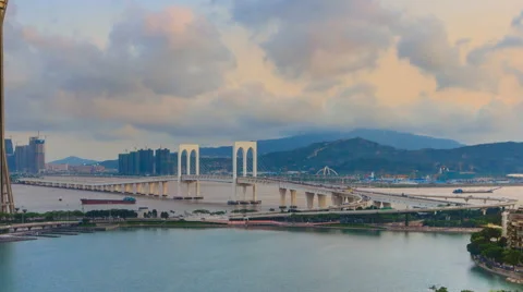 Macau Bridge And Macau Tower Day To Night Time Lapse Of Macau China (zoom out) Stock Footage 64671393