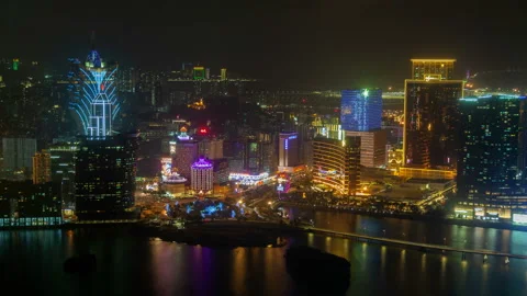 Macau with Cathedral reflected in water in China timelapse Stock Footage 119681250