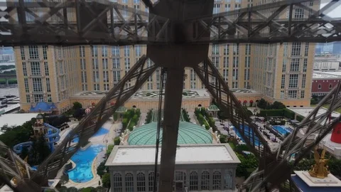 MACAU, CHINA - MAY 2018: Riding up an elevator glass cabin in parisian hotel Stock Footage 90407909