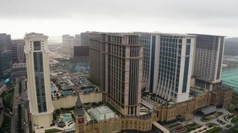 Macau Cotai Strip Forward Down Panning Drone Over Paris Wynn MGM Resorts Stock Footage 327557016