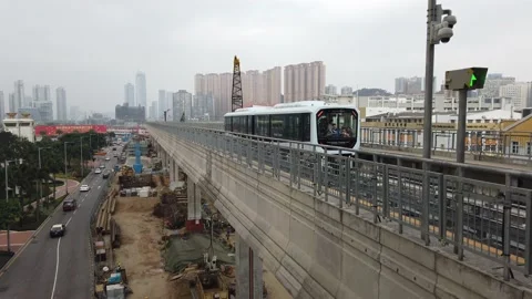 Macau – December 28, 2019: Light Rail Train Approaching Pai Kok Station Video stock 134374710