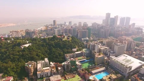 MACAU Flying over the old city center of Macau Sunny day Stock Footage 80981021