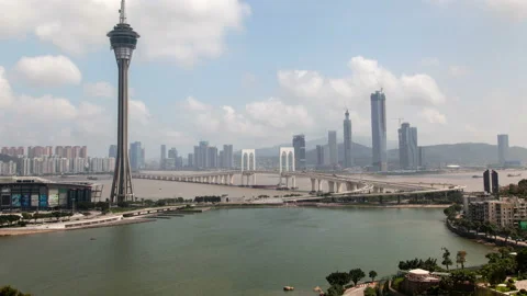 Macau Tower and bridge traffic cityscape timelapse pan up Video stock 121294349