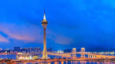 Macau Tower And Macau Bridge Day To Night Time Lapse Of Macau China (zoom out) Stock Footage 64671735