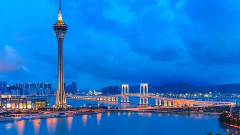 Macau Tower And Macau Bridge Night to Day Time Lapse Of Macau China (zoom in) Stock Footage 76154392