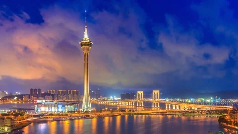 Macau Tower And Macau Bridge Night to Day Time Lapse Of Macau China Stock Footage 76154456