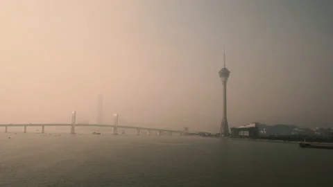 Macau Tower and Sai Van Bridge at sunset - Praia Grande Bay of Nam Van Lake Stockbeeldmateriaal 145603821