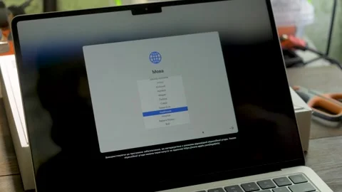 MacBook Air with ARM M3 processor powered on after unboxing Stock Footage 313635769