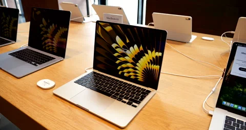 MacBook Air M4 with vivid screen in Apple Store Stock Footage 312178016