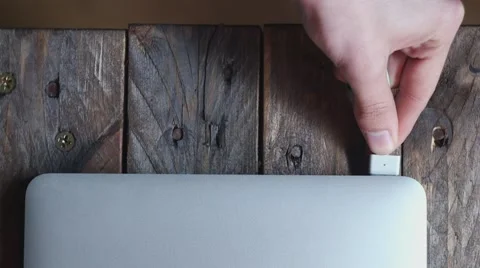 Macbook pro plugin power Stock Footage 63375747