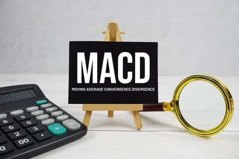 MACD abbreviation of Moving Average Convergence Divergence text with magnif.. Stock Photos