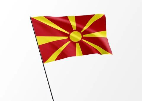 Macedonian flag flying high in the isolated background Illustrazione stock