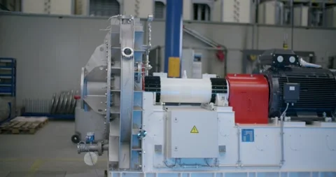 Machine Assembly With Grey Cone Housing and Motor, Factory Hall, Panning View Stock Footage 340451605