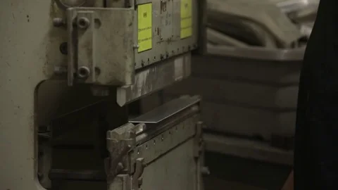 Machine bending metal slow motion Stock Footage 82441813