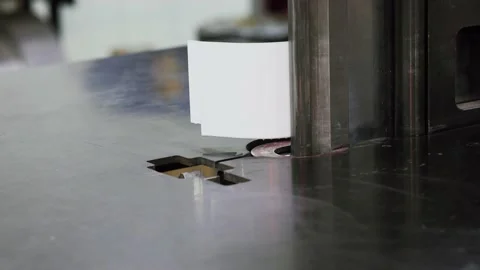 Machine is bending white plastic stripe Stock-Footage 134422523