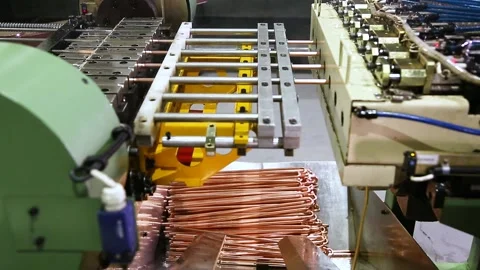 Machine bends copper tubes for air conditioner radiator Stock Footage 162906156
