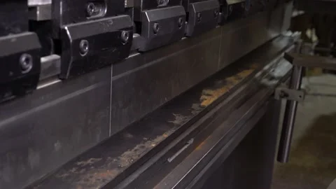 Machine bends a metal part Stock Footage 220723215