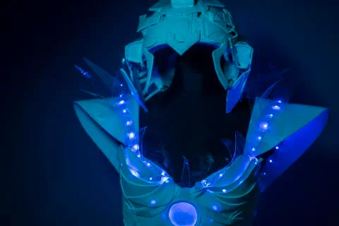 Machine, bionic armor with blue LED lights and plastic materials Stock Photos