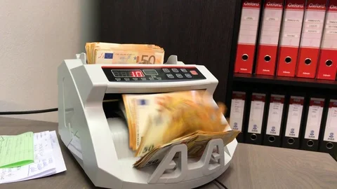 Machine that checks and counts money banknotes in operation. Stock Footage 108397697