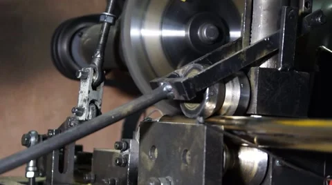 The machine with the circular saw cuts iron rod. Stock Footage 49432343