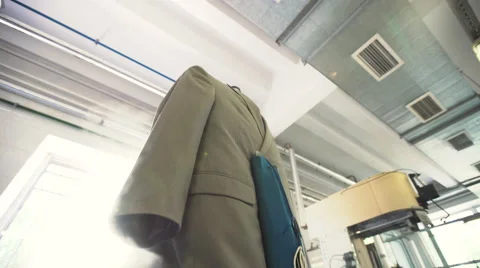 Machine cleaning jacket in a dry-cleaning Stock Footage 64757501