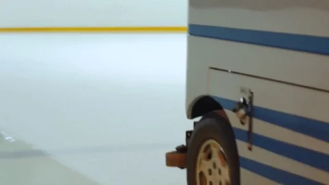 Machine cleans ice skating rink Stock Footage 71622024
