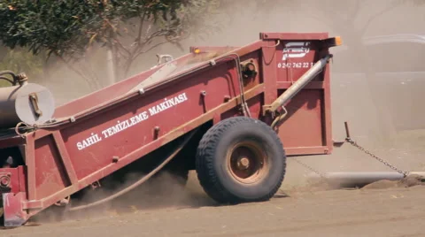 The machine cleans sifts the sand on the beach Stock Footage 44371307