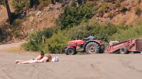 The machine cleans sifts the sand on the beach Stock Footage 44371978