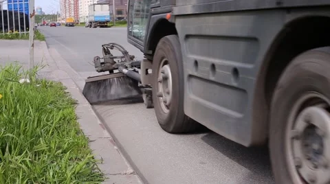 The Machine Cleans/Brushes The Asphalt road Stock Footage 52387383
