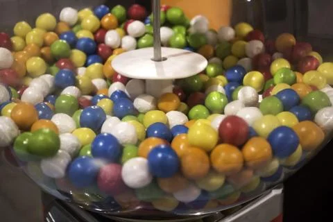 Machine of colored chewing gums, insane food and jelly beans Stock Photos