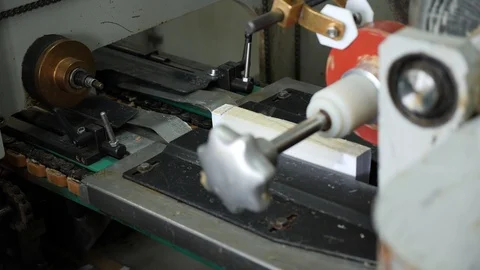 Machine conveyor sticks the roots of future books.  動画素材 98119663