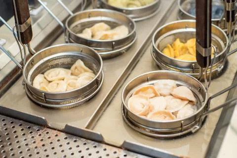 Machine for cooking dumplings Foto stock