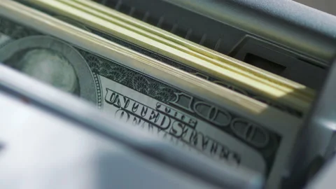 Machine counter automatic calculates a large amount of Dollar banknotes in 4K Video stock 155734477