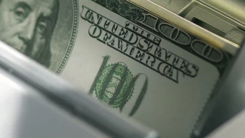 Machine counter automatic calculates a large amount of Dollar banknotes in Slow Stock Footage 155735891
