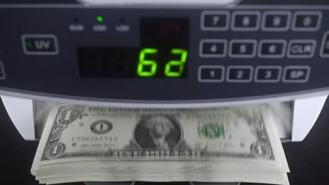 Machine For Counting And Checking The Authenticity Of Dollar Bills. Stock Footage 322521232