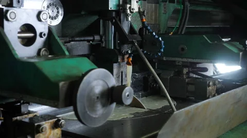 The machine cuts a metal part. Stock Footage 92325037
