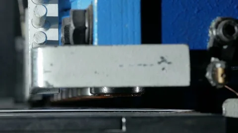 The machine cuts the sheet metal. Large hydraulic guillotine shears. Close-up Stock Footage 71657245