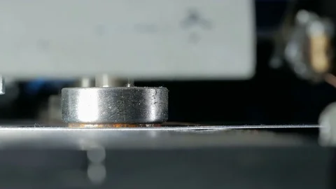 The machine cuts the sheet metal. Large hydraulic guillotine shears. Close-up Stock Footage 71657450