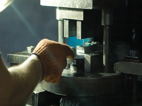 The machine cuts the sheet metal. Large hydraulic guillotine shears. Stock Footage 77935118