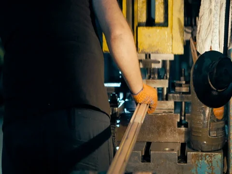 The machine cuts the sheet metal. Large hydraulic guillotine shears. Stock Footage 77954191