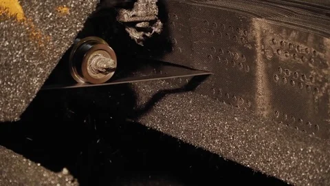 The machine cuts a stack of geogridin the plant. Stock Footage 84240384