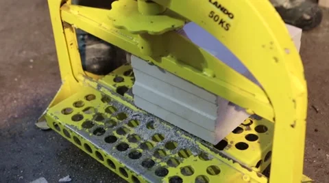 Machine cutting cement block Stock Footage 60443047