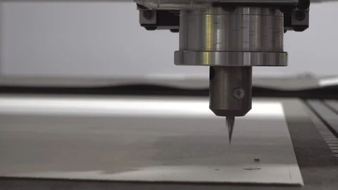 Machine for cutting fabric, leather, and other non-metallic materials Stock Footage 118565173